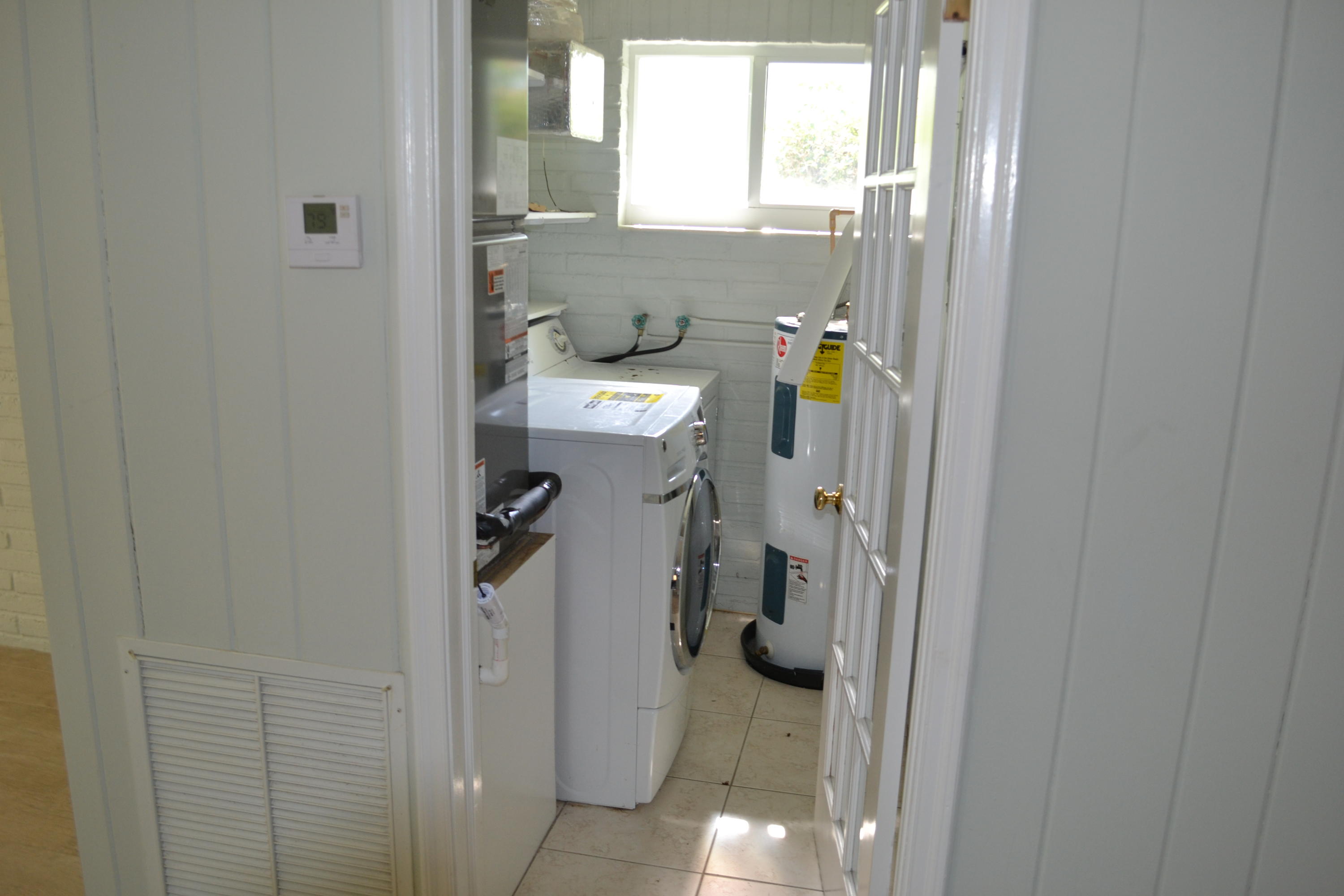 39 Bass Avenue Key Largo, FL 33037 - Photo 9 of 25 a bathroom with a toilet and a shower
