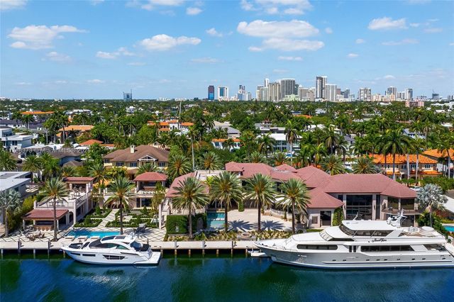 a view of a lake with a city