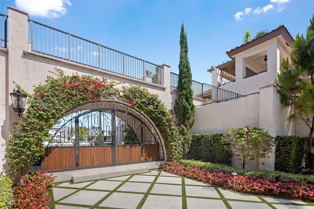 a view of a swimming pool with a table and chairs