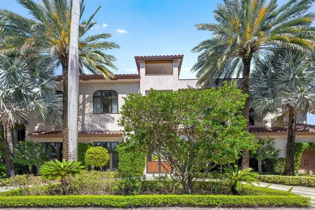a view of a house with a swimming pool