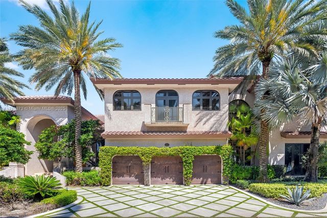 a view of a patio with table and chairs and potted plants