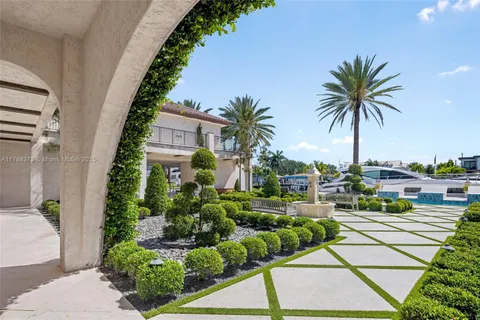 a kitchen with a table and chairs