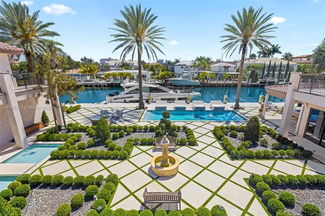 a living room with furniture gym equipment and a large window