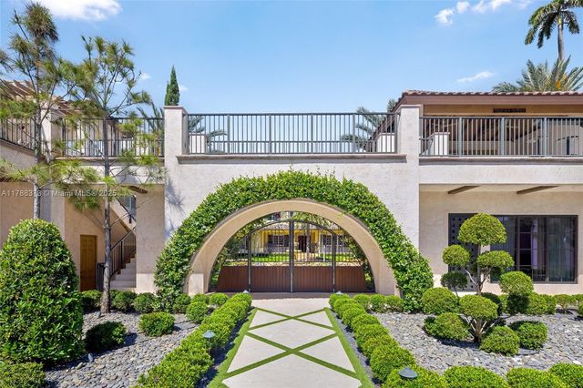 a view of a swimming pool with chairs