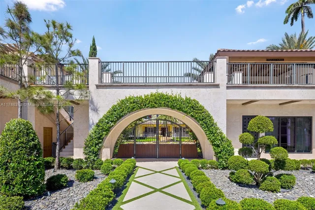 a view of a swimming pool with chairs