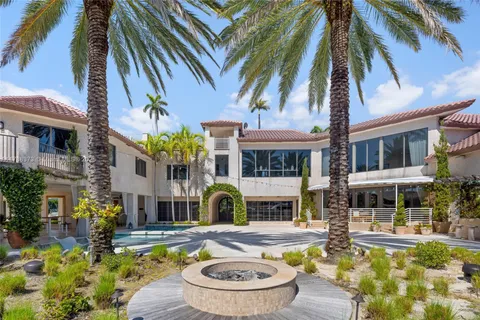 a kitchen with a table and chairs in it