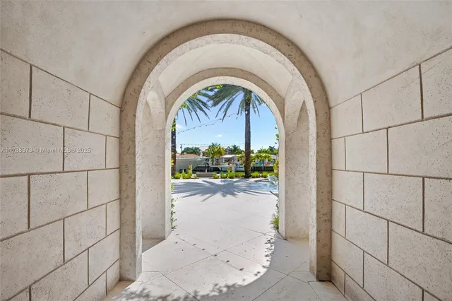 a view of a kitchen with a sink and a fireplace