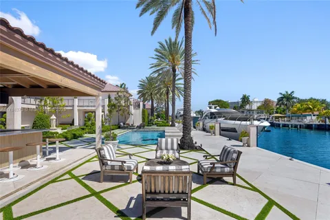 a dinning table and chairs in a patio