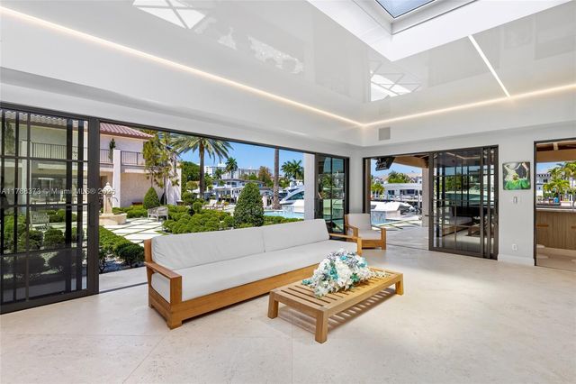 a view of a house with brick walls