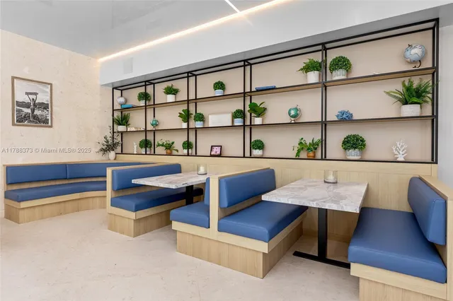 a view of a chairs and tables in patio