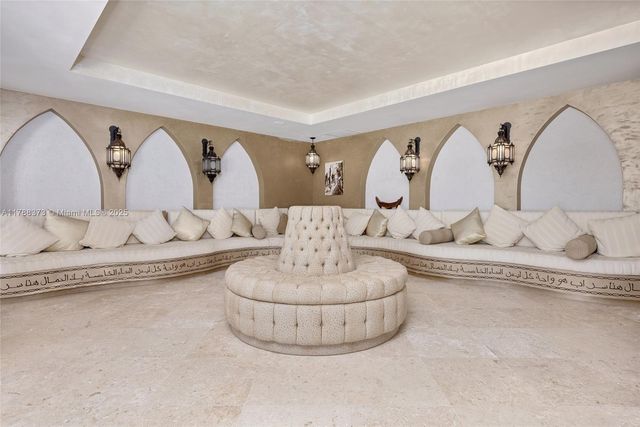 a large bathroom with a granite countertop sink mirror and a