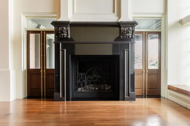 a large kitchen with stainless steel appliances granite countertop a stove and a refrigerator