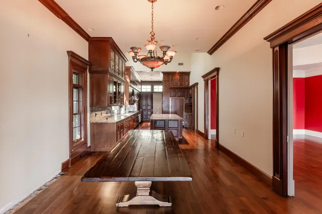 a view of an empty room with a balcony