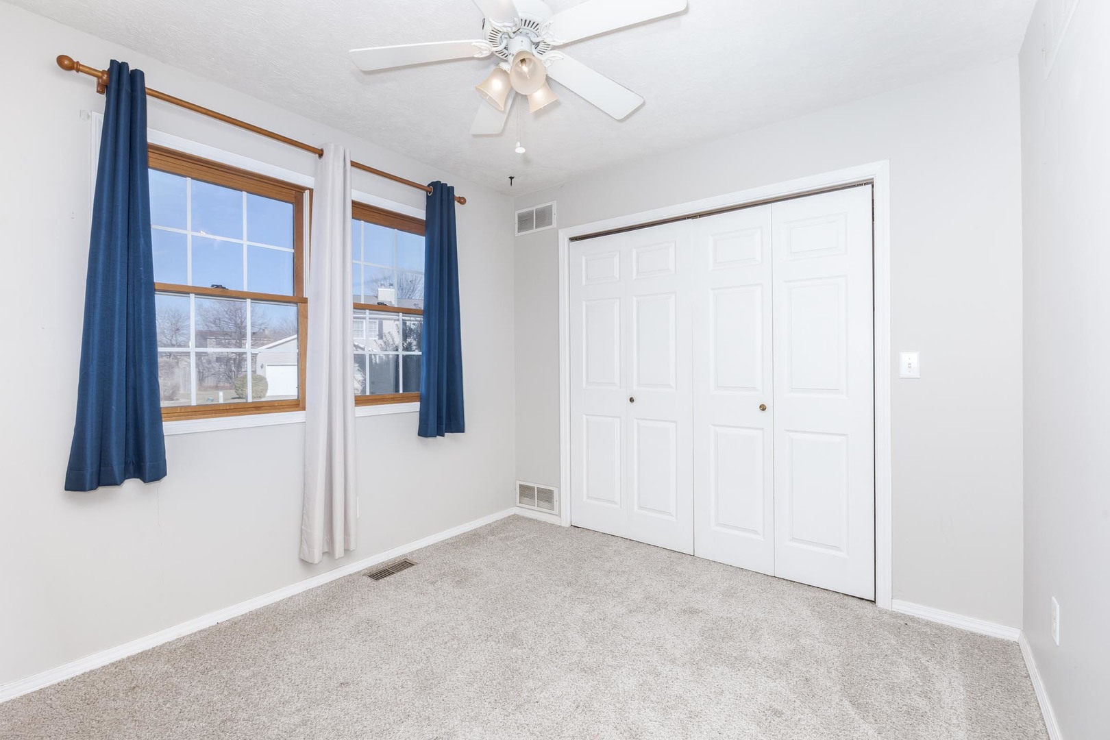 1321 Beacon Hill Court Normal, IL 61761 - Photo 11 of 45 a view of an empty room with a window