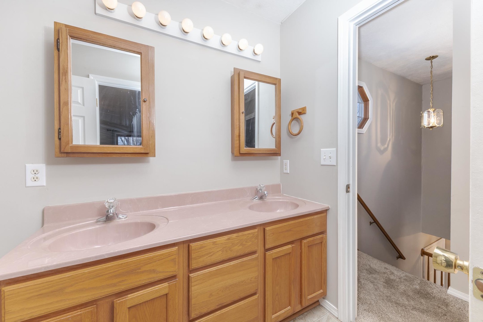 1321 Beacon Hill Court Normal, IL 61761 - Photo 19 of 45 a bathroom with a sink double vanity and a mirror