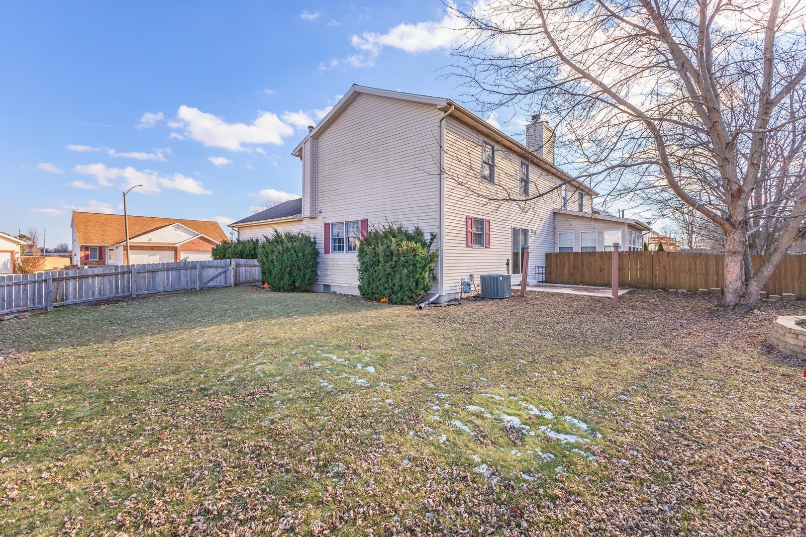 1321 Beacon Hill Court Normal, IL 61761 - Photo 28 of 45 a view of a house with a yard