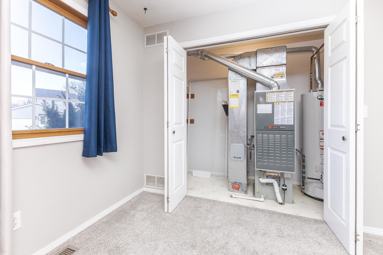 1321 Beacon Hill Court Normal, IL 61761 - Photo 32 of 45 an empty room with windows