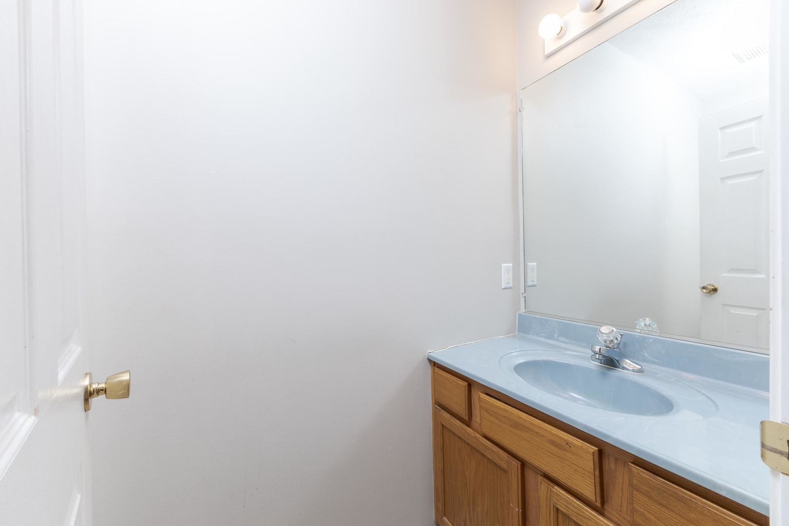 1321 Beacon Hill Court Normal, IL 61761 - Photo 8 of 45 a bathroom with a sink and a mirror