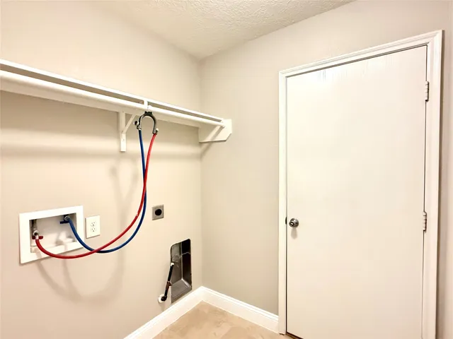 a picture of a bathroom with a glass shower door