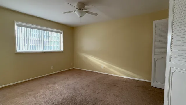 an empty room with a bathroom
