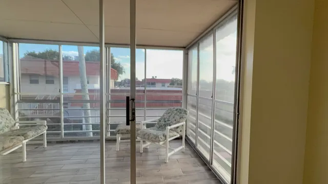 a bathroom with a glass door