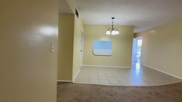 a view of a livingroom with a chandelier