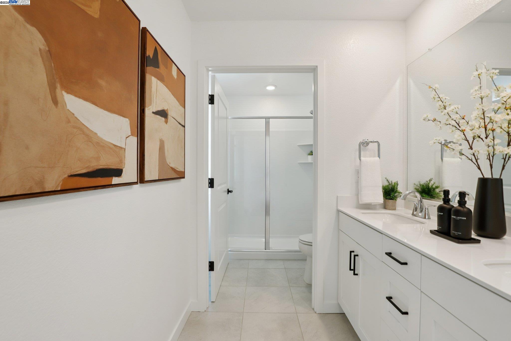 863 Pecan Tree Lane Galt, CA 95632 - Photo 21 of 30 a bathroom with a shower and a sink