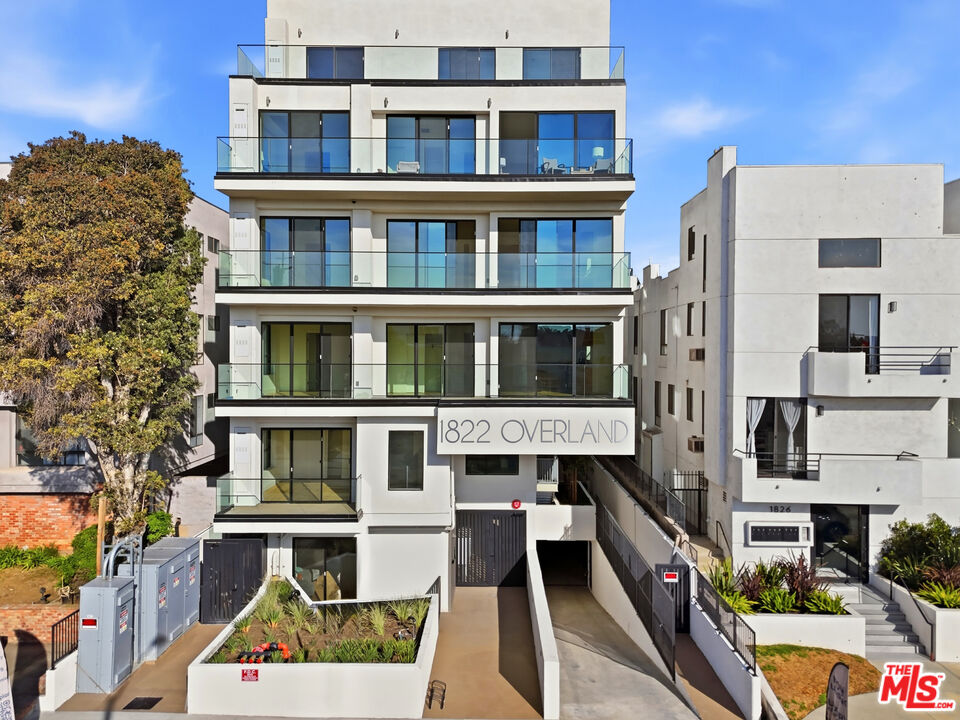1822 Overland Avenue, Unit 103 Los Angeles, CA 90025 - Photo 1 of 10 a aerial view of a house with balcony