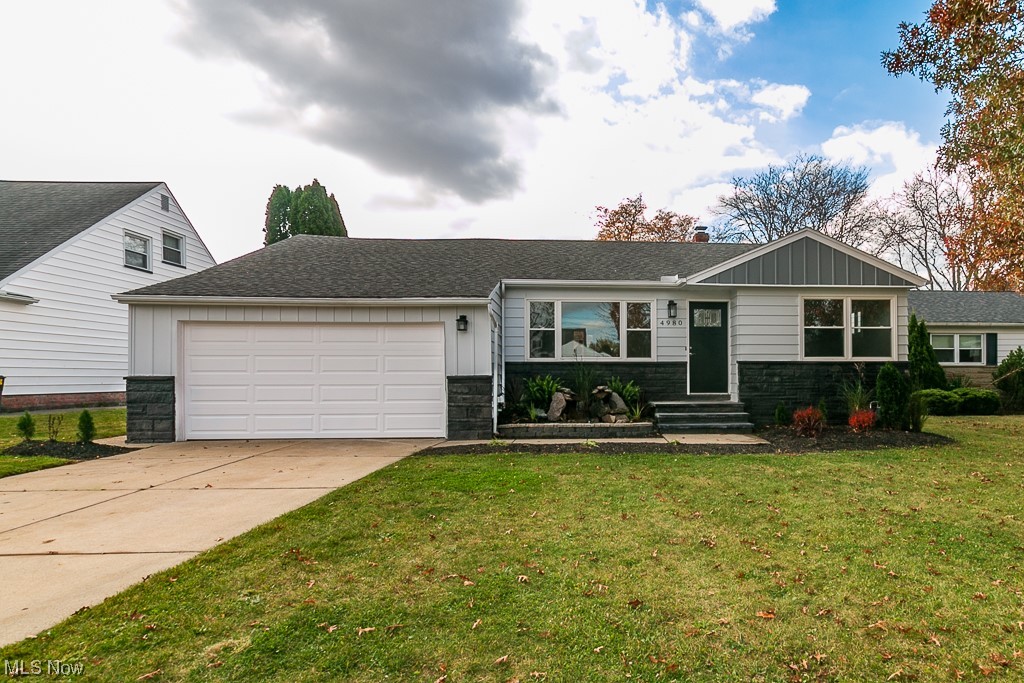 4980 Emmet Road Lyndhurst, OH 44124 - Photo 1 of 39 View of front of home with a garage and a front yard