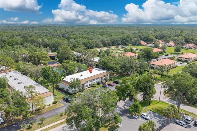 an aerial view of a city with lots of residential buildings