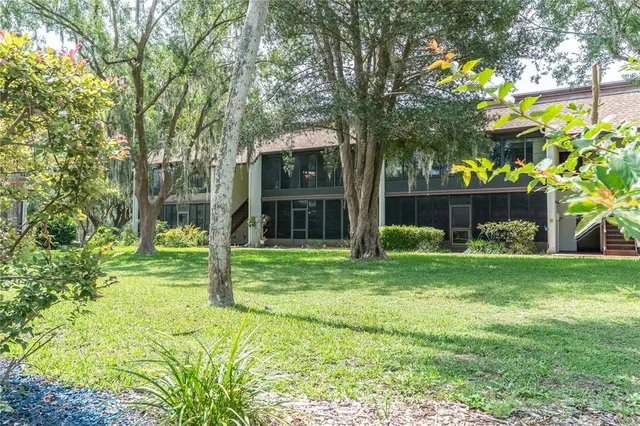 a view of a house with a garden