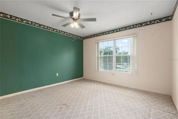 a view of a hallway with a window