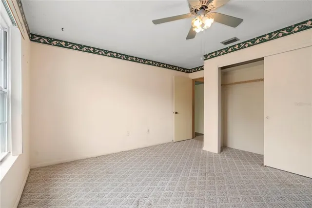 a kitchen that has a sink and a stove