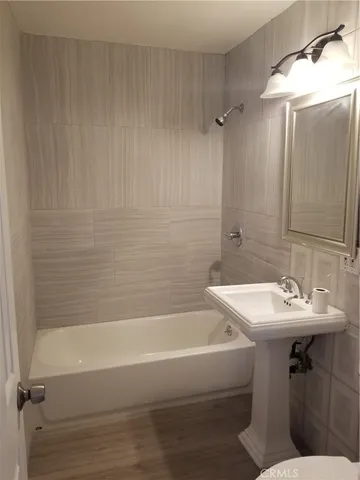 a bathroom with a sink and a bathtub