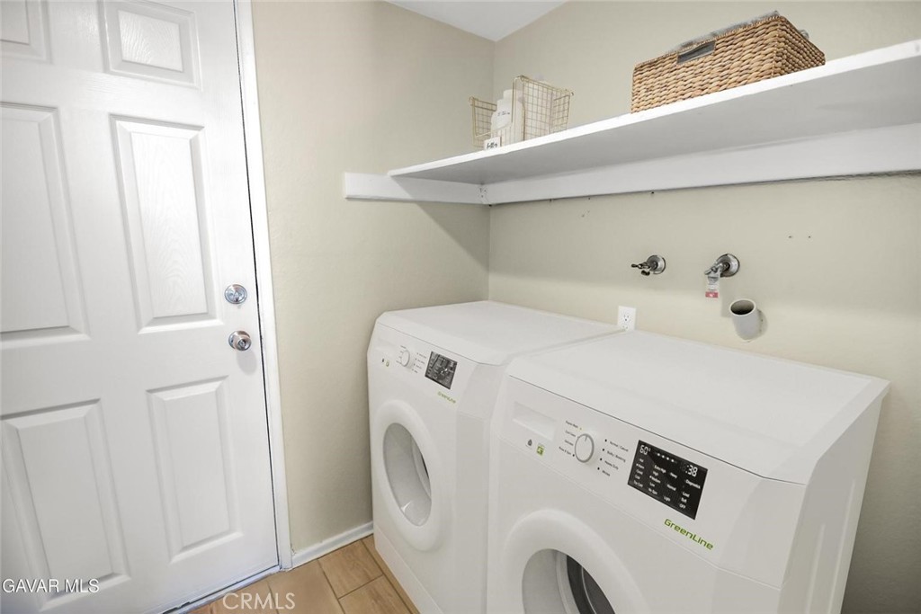 44910 12th Street East Lancaster, CA 93535 - Photo 22 of 47 a utility room with dryer and washer