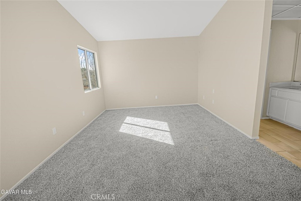 44910 12th Street East Lancaster, CA 93535 - Photo 27 of 47 an empty room with a empty space and windows
