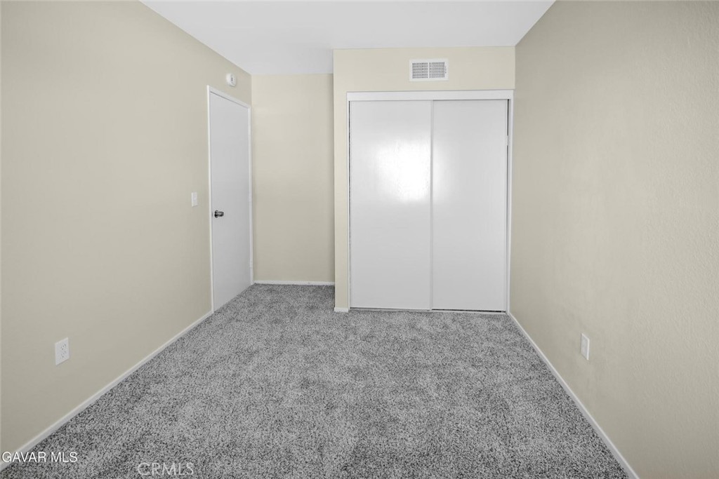 44910 12th Street East Lancaster, CA 93535 - Photo 35 of 47 a view of hallway with window