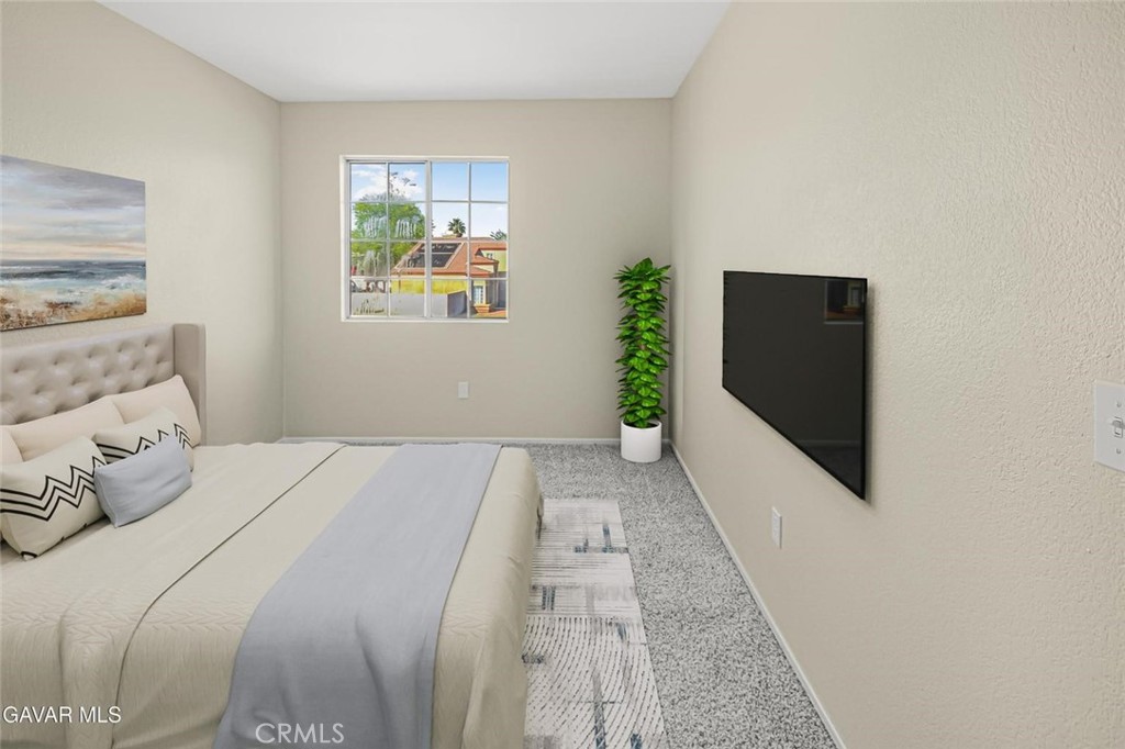 44910 12th Street East Lancaster, CA 93535 - Photo 38 of 47 a bedroom with a bed and a window