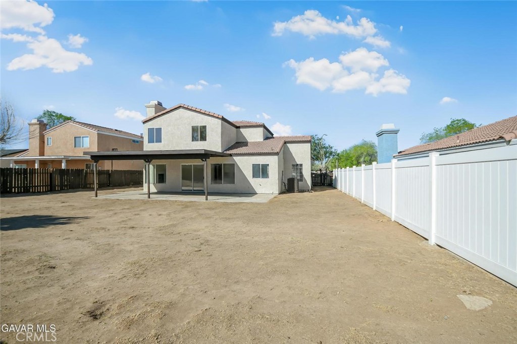 44910 12th Street East Lancaster, CA 93535 - Photo 47 of 47 a front view of a house with a yard