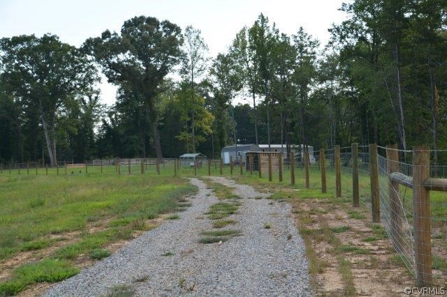 140 Sheppards Road Farmville, VA 23901 - Photo 7 of 22 a backyard of a house with lots of green space