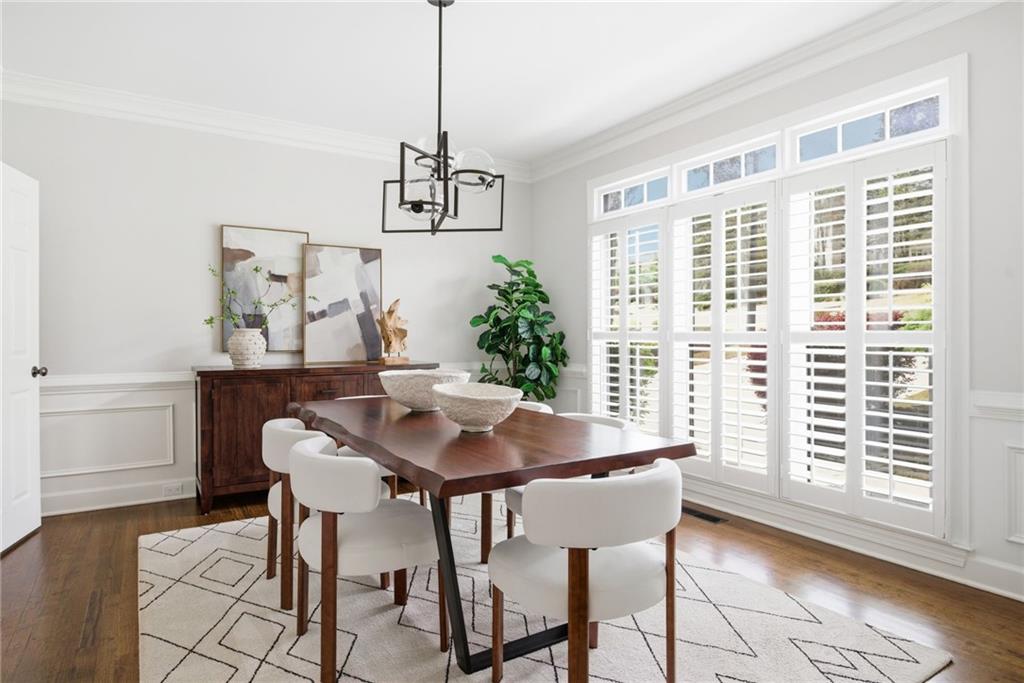 5335 Cottage Farm Road Johns Creek, GA 30022 - Photo 6 of 60 a view of a dining room with furniture window and wooden floor