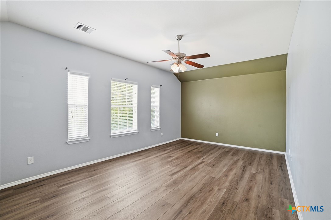 316 Housefinch Loop Leander, TX 78641 - Photo 20 of 37 Private owner’s suite with generous space and multiple windows.