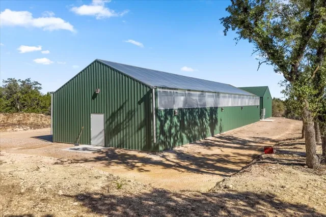 a view of an empty room with windows