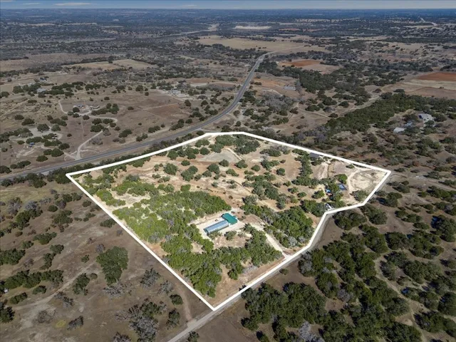 a house with trees in front of it