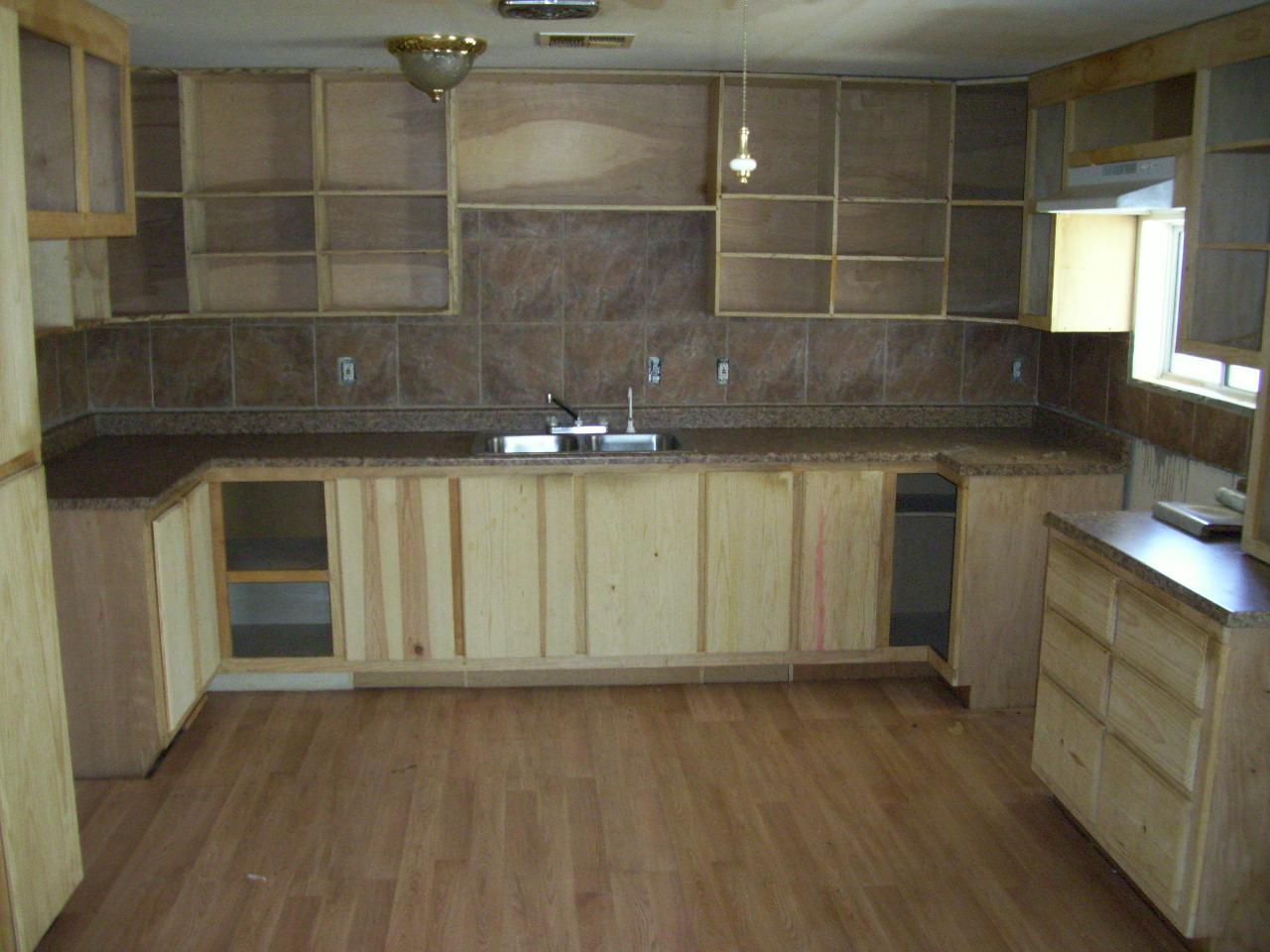 5902 West Granada Road Phoenix, AZ 85035 - Photo 4 of 5 a kitchen with a sink and cabinets