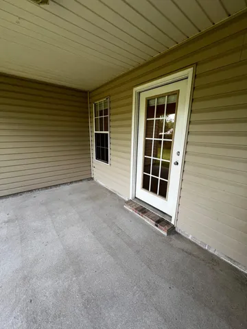 a view of a yard with a trees