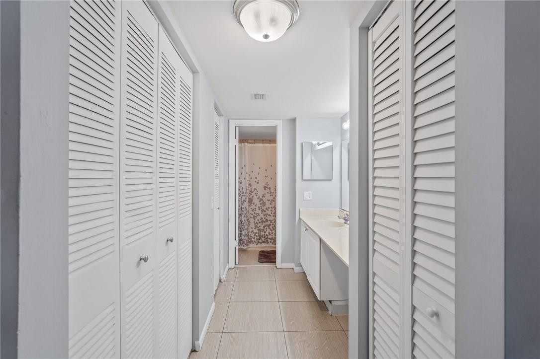 721 North Pine Island Road, Unit 302 Plantation, FL 33324 - Photo 13 of 25 a view of a hallway with elevator