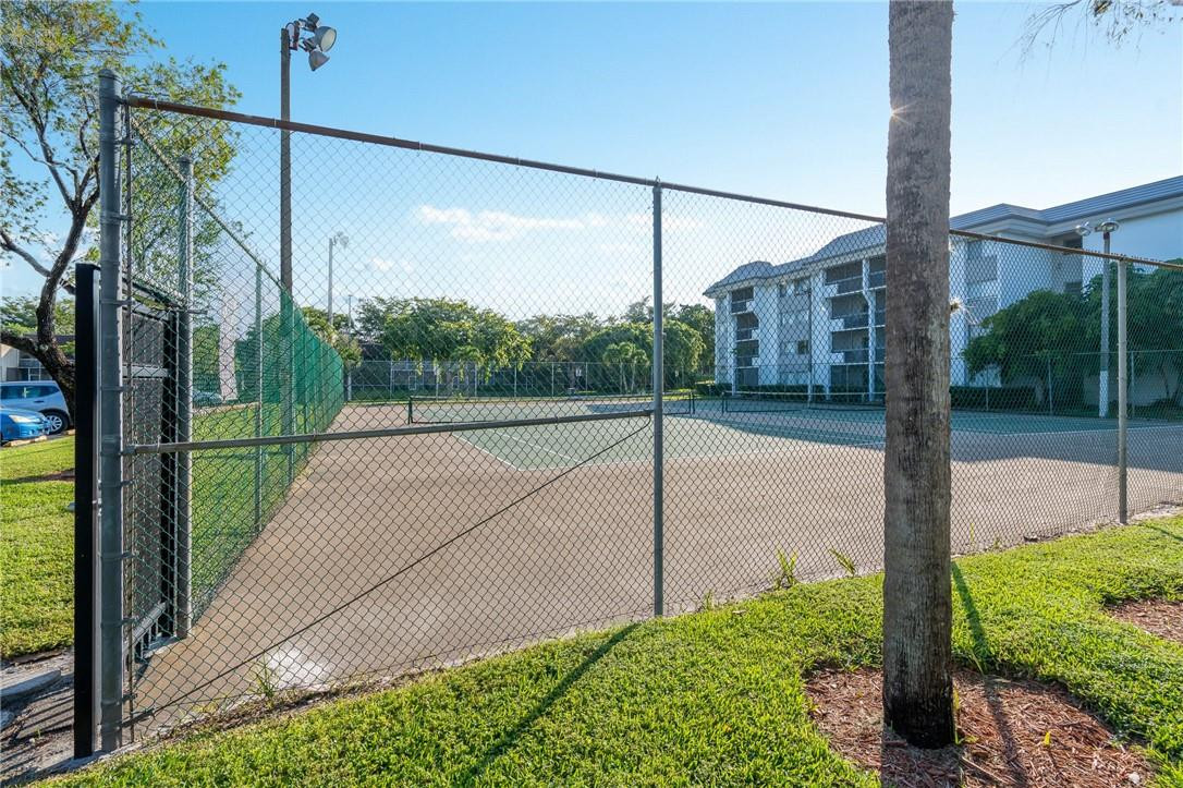 721 North Pine Island Road, Unit 302 Plantation, FL 33324 - Photo 18 of 25 a view of a garden from a balcony