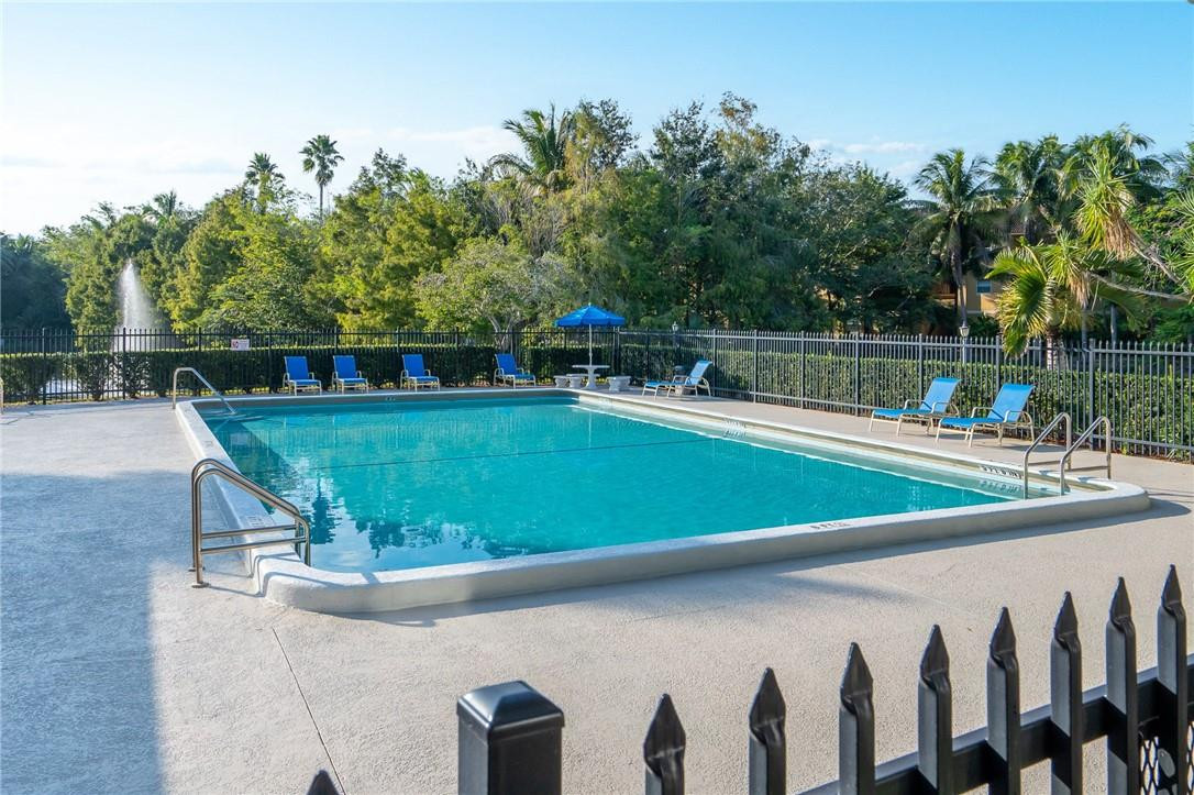 721 North Pine Island Road, Unit 302 Plantation, FL 33324 - Photo 20 of 25 a view of a swimming pool with a patio