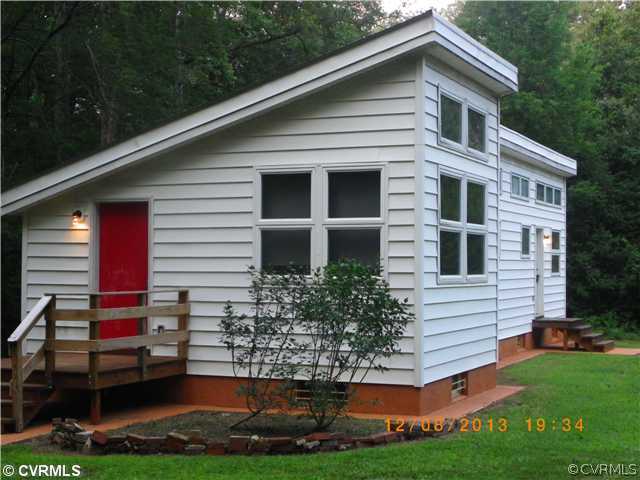 1025 Pothole Road Manakin-Sabot, VA 23103 - Photo 2 of 8 a front view of a house with a yard